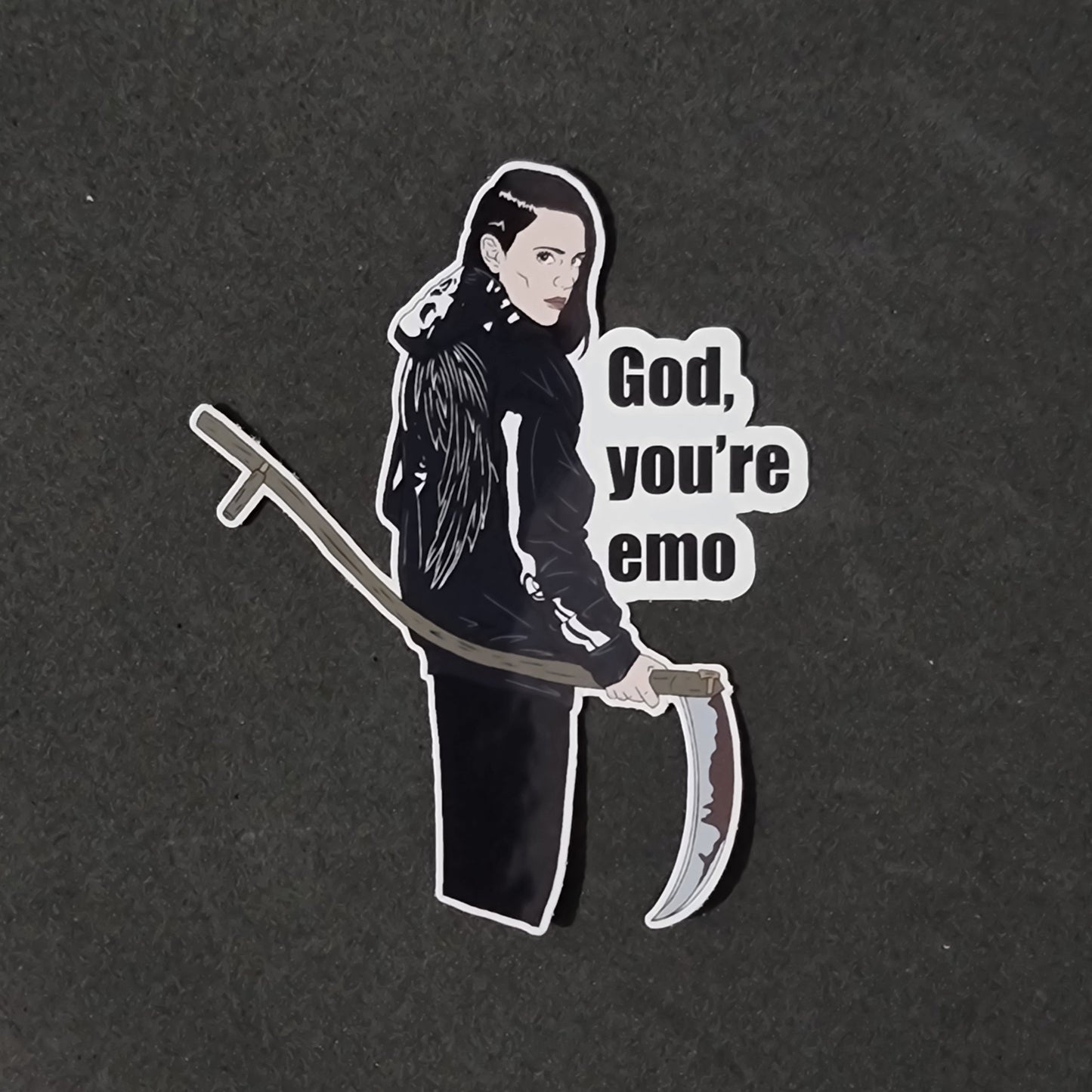 Sticker of Em Cypress and text 'God, you're emo' on a black background
