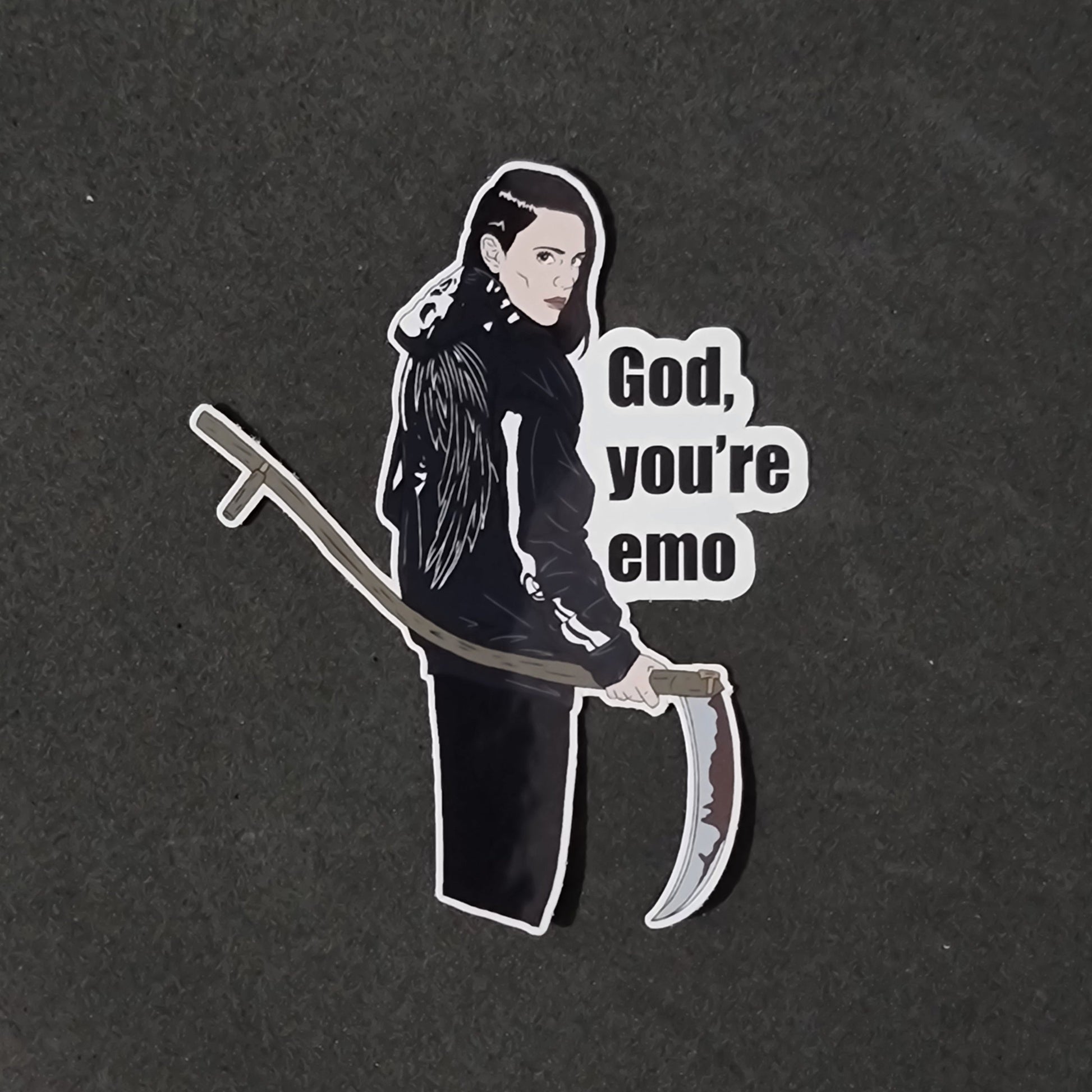 Sticker of Em Cypress and text 'God, you're emo' on a black background